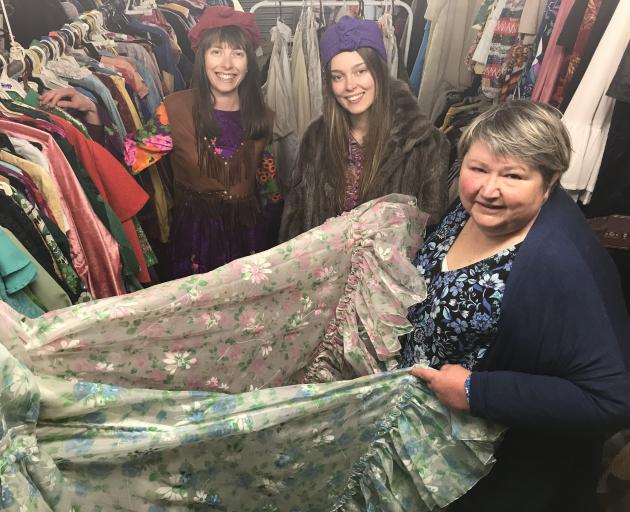 Maegan Young (left), Susan Manson and Sophie Moestl show off some of the Wanaka Theatre Group’s...