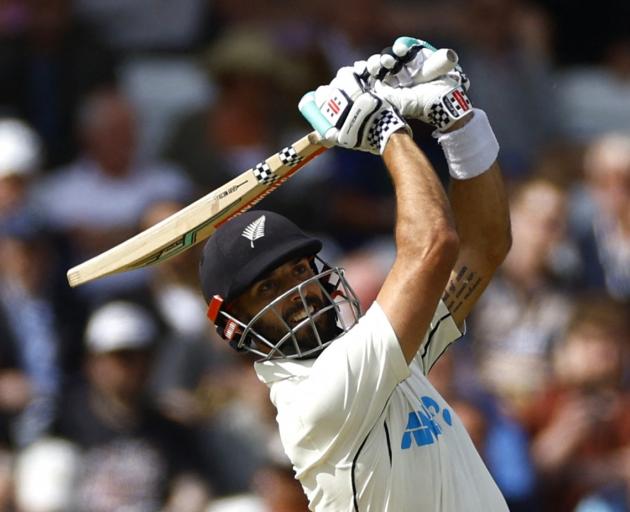 New Zealand's Daryl Mitchell hits a six off the bowling of England's Jack Leach. The ball landed...