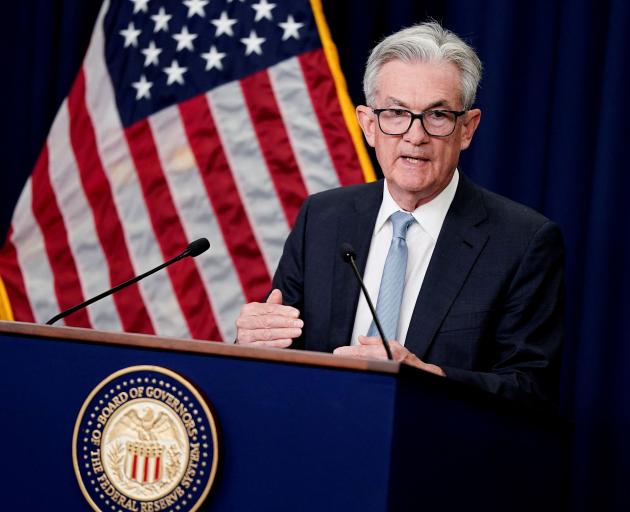 United States Federal Reserve chairman Jerome Powell takes questions at a news conference...