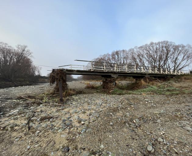 The Scott Lane bridge stops midway over the Kyeburn riverbank.