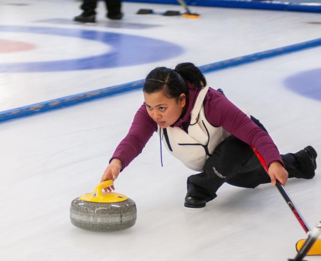 Eleanor Adviento, of Auckland, competes during the New Zealand Curling Championships in Naseby at...