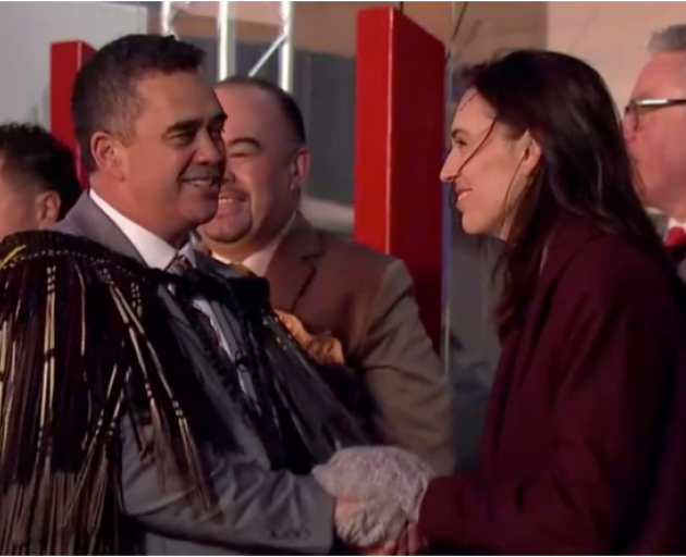 Dr Rangi Matamua welcomes Jacinda Ardern to the ceremony outside Ta Papa in Wellington. Photo: RNZ