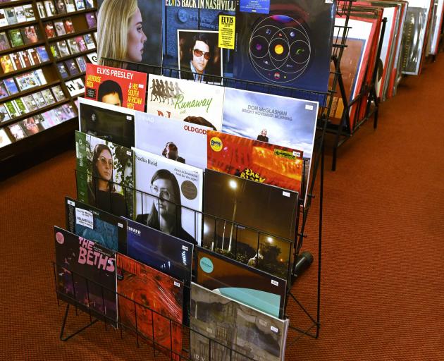 Disk Den still stocks vinyl records, cassettes and CDs, but business is quiet compared with its...
