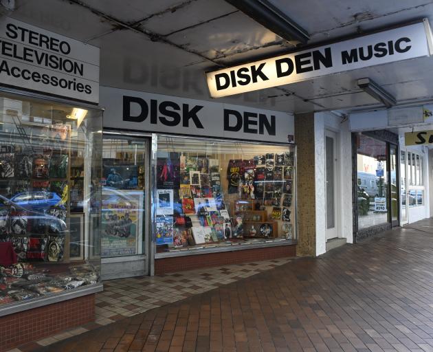 Disk Den’s Princes St window displays of t-shirts, albums and posters are well known to...