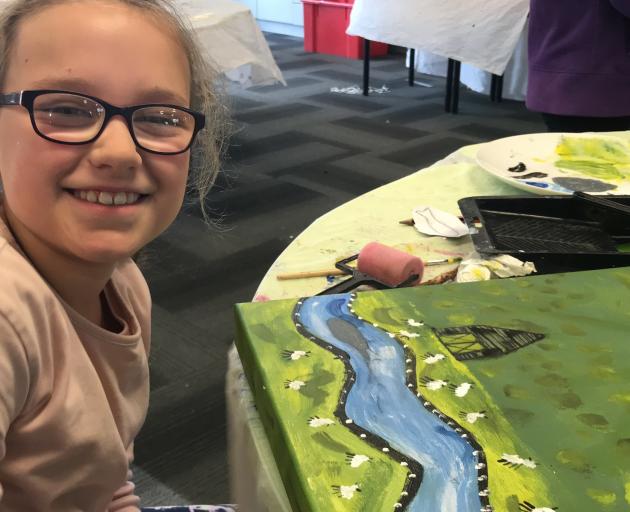 Hawea Flat School pupil Gemma Cragg works on a landscape.