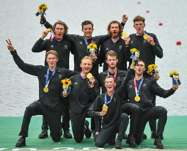 NZ men's eight after winning gold at the Tokyo Olympics. Photo: Getty Images