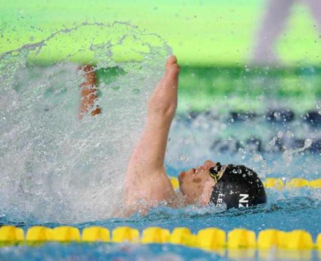 New Zealand swimmer Cameron Leslie competes in the 50m backstroke S4 final at the world para...