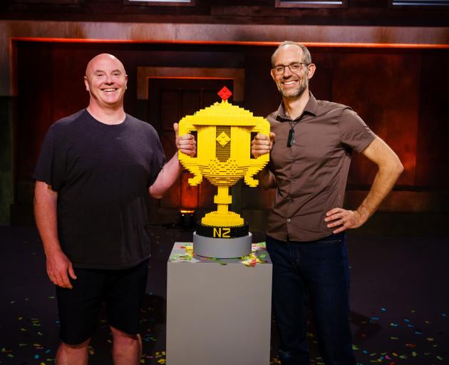 Lego Masters New Zealand winners (from left) Glenn Knight and Jake Roos with the coveted trophy.