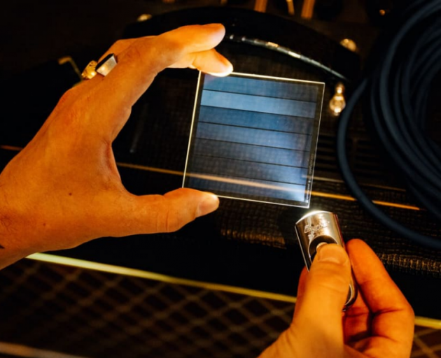 'Project silica' etches music data on thin glass slides the size of coasters. Photo: Supplied 