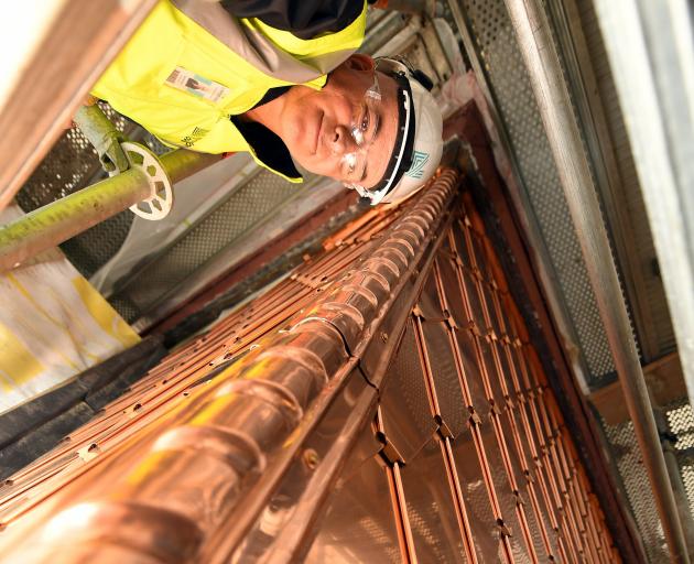 Looking down on copper turret tiling is Naylor Love site manager Gary Arlidge. PHOTO: STEPHEN...