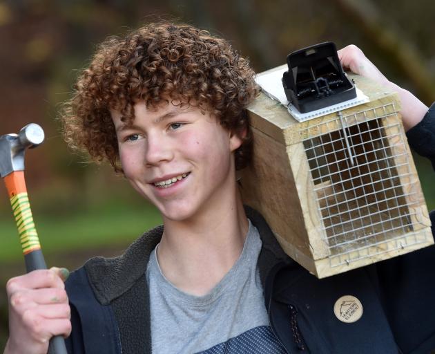 Ted Menzies (15), of Mornington, holds the rat trap he built at Chingford Park on Saturday. PHOTO...