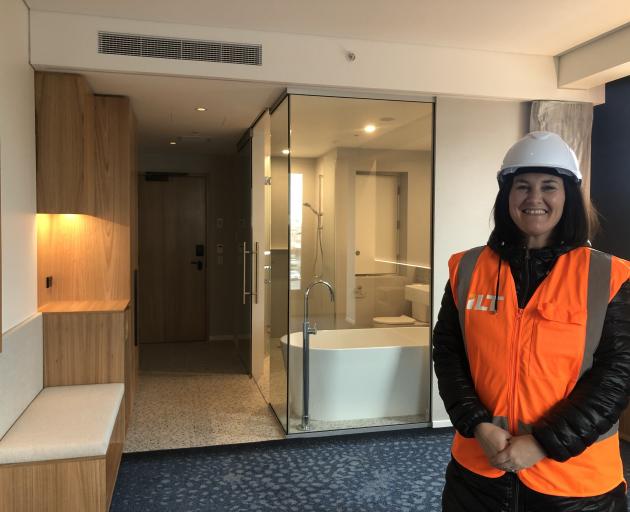 ILT communications manager Emma Hunter shows one of the 78 suites of the hotel. PHOTO: LUISA GIRAO