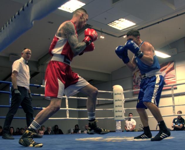 Dunedin boxer Shaun Crawford eyes up opponent Forrest Davidson at the South Island Golden Gloves...
