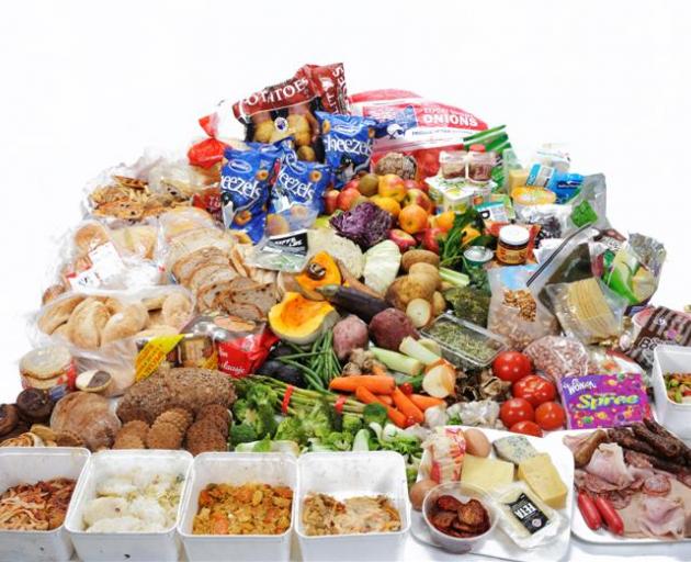 This 42kg pile of food waste found in rubbish bins during the audit is a little more than half...
