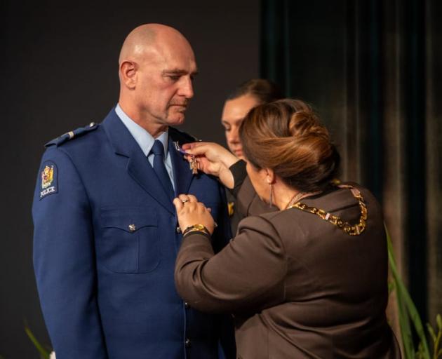 Senior Constable Scott Carmody receives the New Zealand Bravery Decoration. Photo: RNZ / Nate...