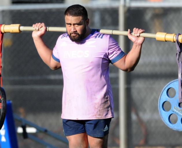 All Blacks prop Nepo Laulala balances weights at Logan Park yesterday. PHOTOS: GERARD O'BRIEN