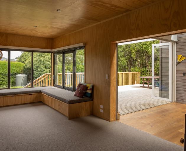 Couches and window seats double as beds when there are visitors. PHOTO: ANDY SPAIN