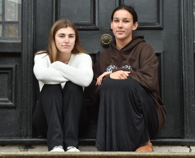 Hannah Martin (left) and Annaleise Geerligs say the power cuts have been going on for about two...