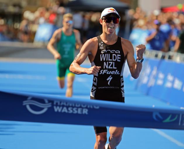 Triathlete Hayden Wilde wins a world series race in Hamburg earlier this month. PHOTOS: GETTY IMAGES