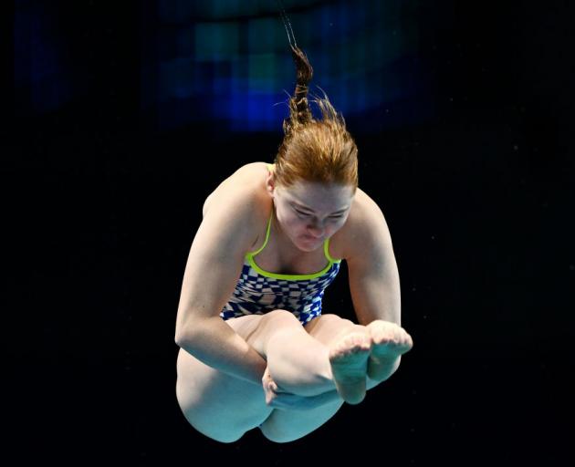 New Zealander Maggie Squire competes in the women’s 1m springboard preliminaries at the Fina...