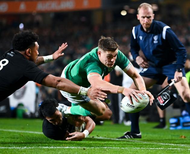 Ireland's Garry Ringrose scores a try at Eden Park last night. Photo: Getty Images 