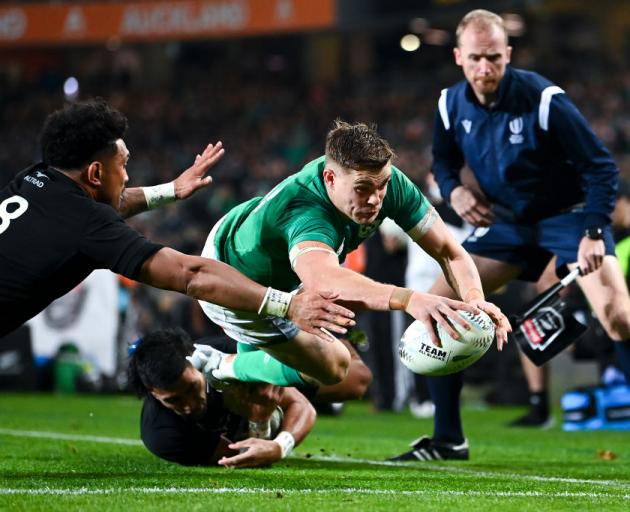 Ireland's Garry Ringrose scores a try at Eden Park last night. Photo: Getty Images