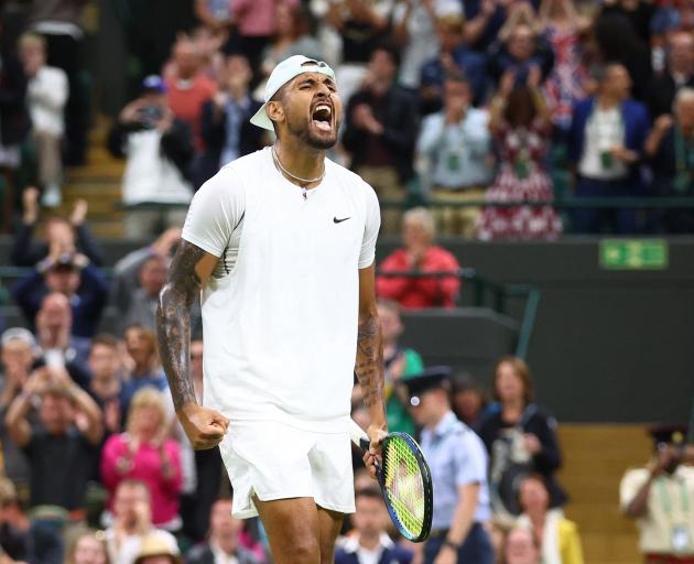 Nick Kyrgios celebrates winning his third round match on Saturday. Photo: Reuters  