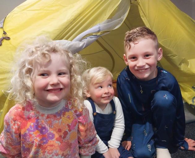 Visiting grandparents living in Wanaka, Lucy (4), Jesse (2) and David (7) Phipps, of the Hibiscus...
