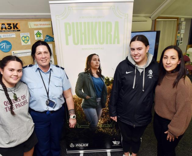 Attending a recruitment drive at the South Dunedin police station on Wednesday night are (from...