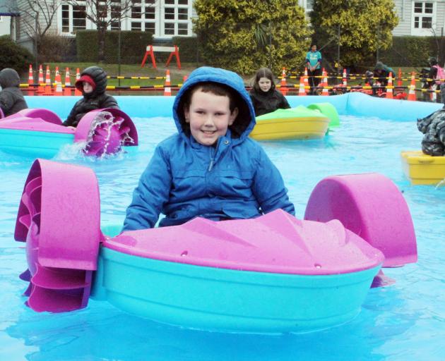 Kellan Langley has a blast in the paddle boats at ILT Kidzone Winter Wonderland. PHOTO: LUISA GIRAO