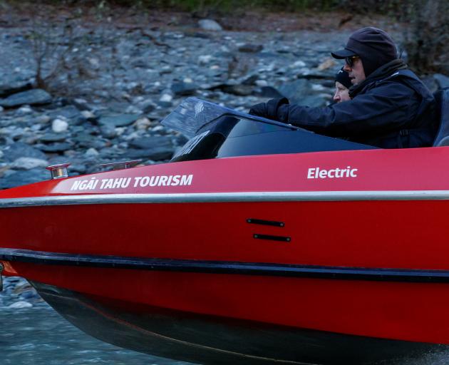 Head driver Nick Simpson takes Shotover Jet's electric prototype for a spin on Kimiākau River....