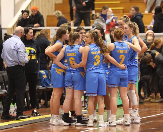 The Southern Hoiho huddle after their first game of the season, against the Mainland Pouakai in...