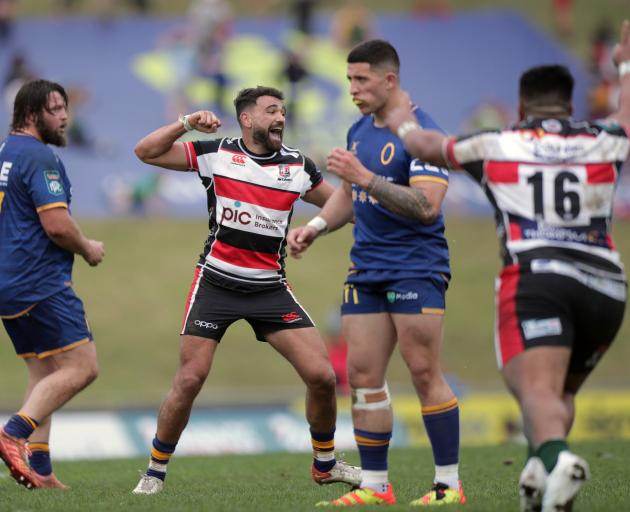 Counties-Manukau first five Riley Hohepa (second from left) and team-mate Ioane Moananu celebrate...