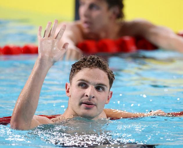 Lewis Clareburt celebrates winning gold in the men's 200m butterfly. PHOTOS: REUTERS