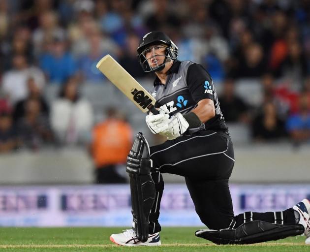 Ross Taylor plays a sweep shot during the Black Caps twenty20 against India at Eden Park. Photo:...