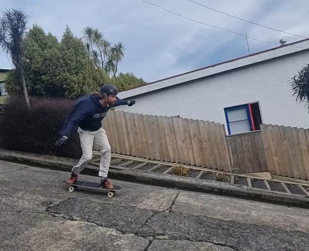 Australian downhill skateboarder Zak Mills-Goodwin skates down Baldwin St in Dunedin yesterday....