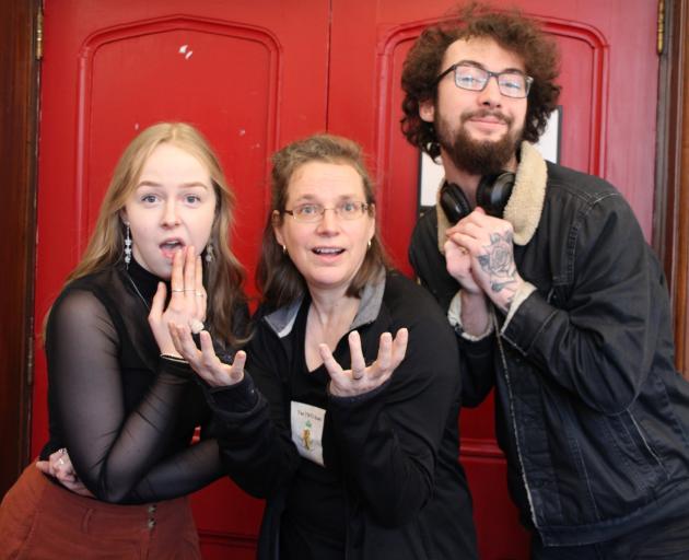 Kaitlyn Cooper (left), Sarah Barham and Zac Henry prepare for Shot Glass Shorts play competition....