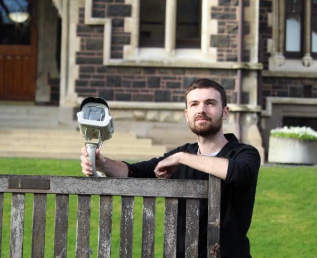 University of Otago second year masters student Thomas Stevenson shows one of the sky-facing...