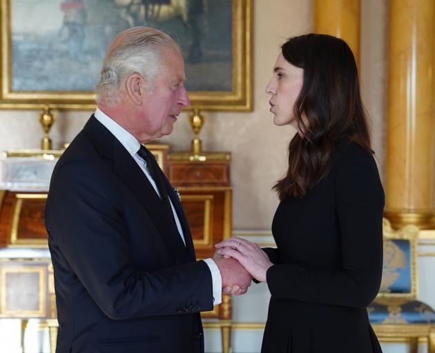 King Charles III speaks to Prime Minister Jacinda Ardern at Buckingham Palace yesterday, ahead of...