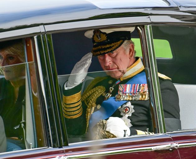 King Charles III and Camilla, Queen Consort following the state funeral of Queen Elizabeth II at...