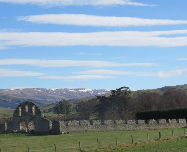 The ruins of the Teviot Station woolshed still shelter sheep. Built in the early 1800s of...