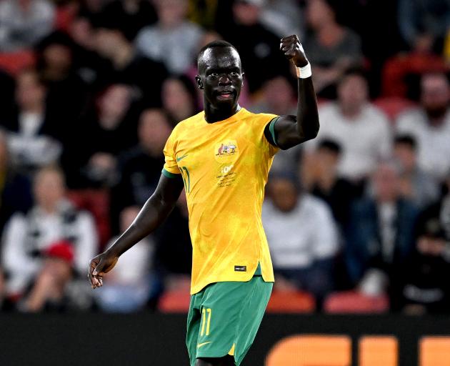 Awer Mabil of Australia celebrates after scoring a goal during the International Friendly match...