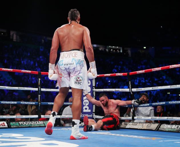 Joseph Parker is knocked down for the first time in his career by Joe Joyce during their bout in...