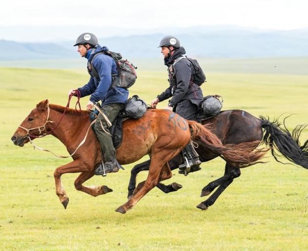 North Canterbury brothers Ben (left) and Hugh Dampier-Crossley gallop across the Mongolian...