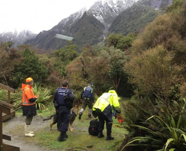 Police officers get ready to search for the man. Photo: Supplied