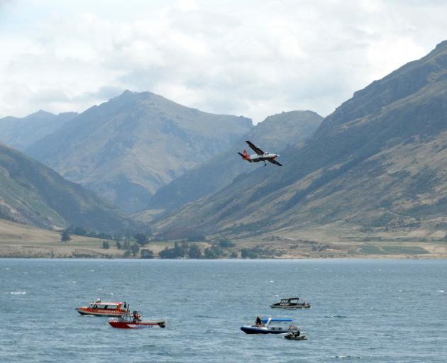 Planes, boats and jet skis search for a missing skydiver Tyler Nii in Lake Wakatipu in 2018....