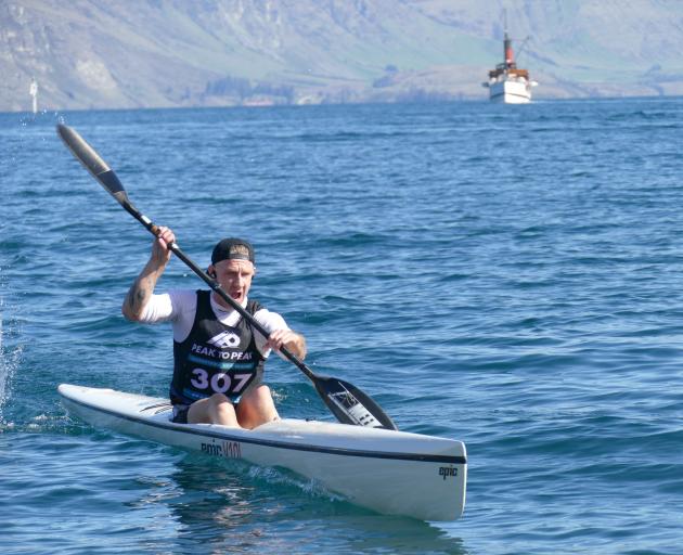 Alexander Dodds, of The Filaments team, on the final stretch of the 7km kayak leg during Saturday...