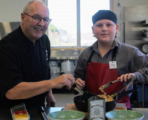 Invercargill chef and restaurateur Graham Hawkes tries the pasta created by St Peter's College...