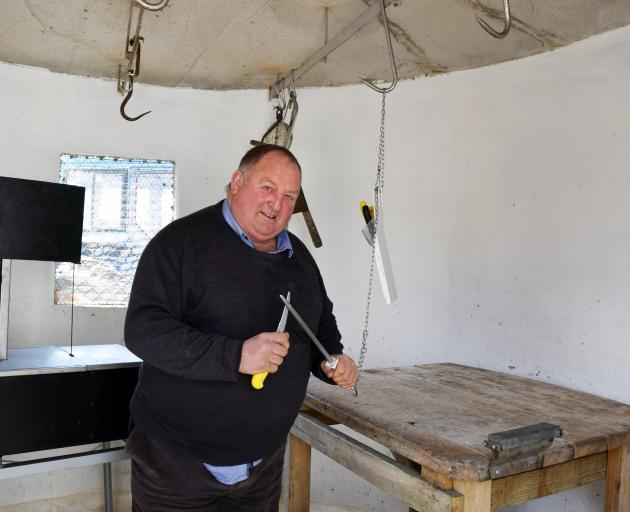 Ross Smaill in an abattoir on his property in Dunedin.
