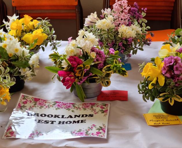 Residents of Brookland’s Rest Home played their part in the Outram Flower Show with pretty spring...